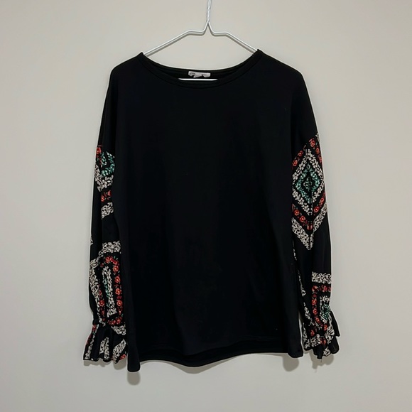 Black shirt with long, patterned sleeves. Women’s size L - Picture 2 of 5